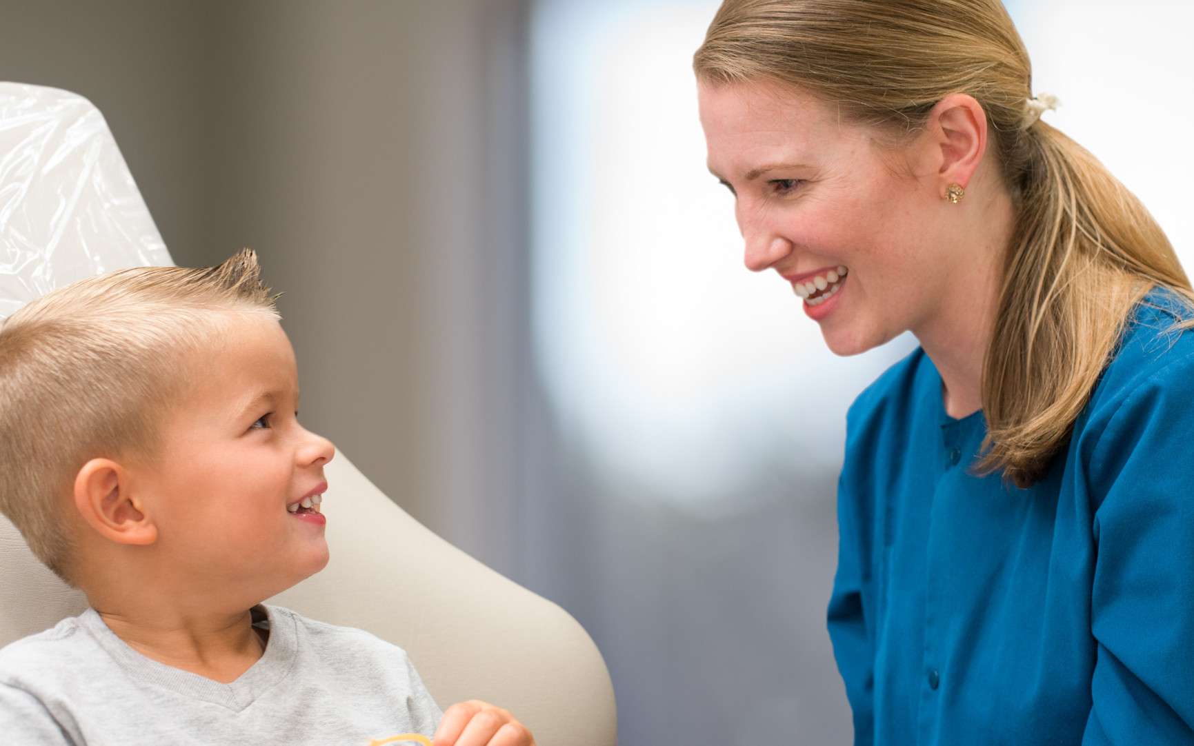 Dentist with Patient at Laxer, Long, and Savage Office